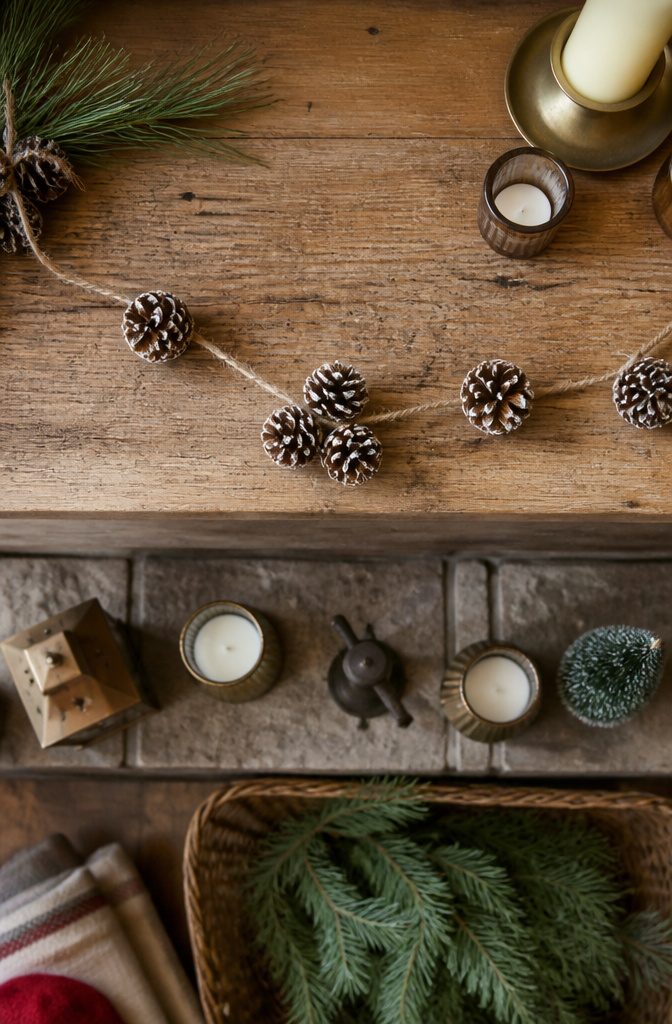 20 Easy Christmas Decor DIY Ideas for a Homemade Holiday 8 Pine cone garland strung together, ready for decoration.