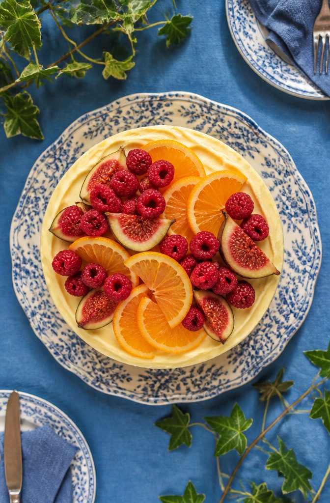 15 Simple Cake Decorating Ideas for 2026 — No Piping Required 4 A cake decorated with berries and citrus slices.